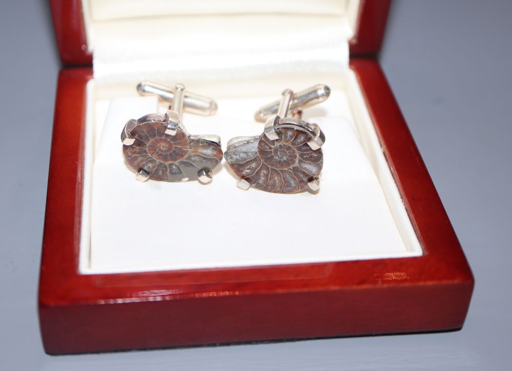 A pair of modern 925 and ammonite cufflinks.